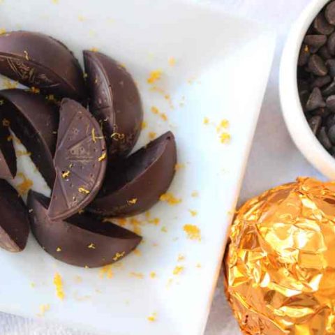 Christmas traditions often center around food--including those chocolate oranges wrapped in orange foil that break into chocolate orange slices. Instead, try these Keto Sugar Free Chocolate Orange Truffles. #chocolateorangetruffles #ketotruffles