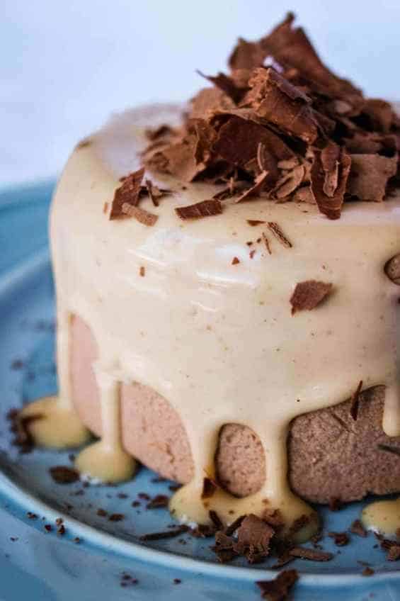 Soooo delicious! Indulgent, rich keto chocolate peanut butter ice cream cheesecake with peanut butter sauce and chocolate shavings.